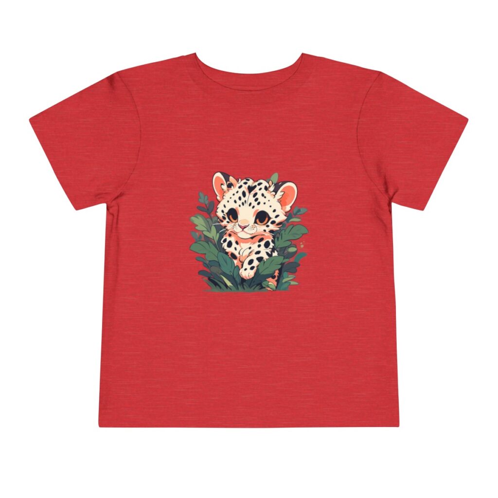 A cute baby leopard design tshirt for toddlers peeking from greenery